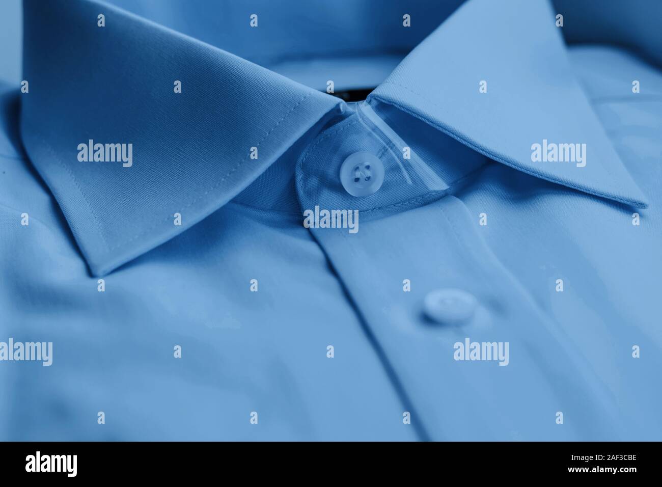 Classic blue business shirt. Close up. Collar. Concept men's ironed