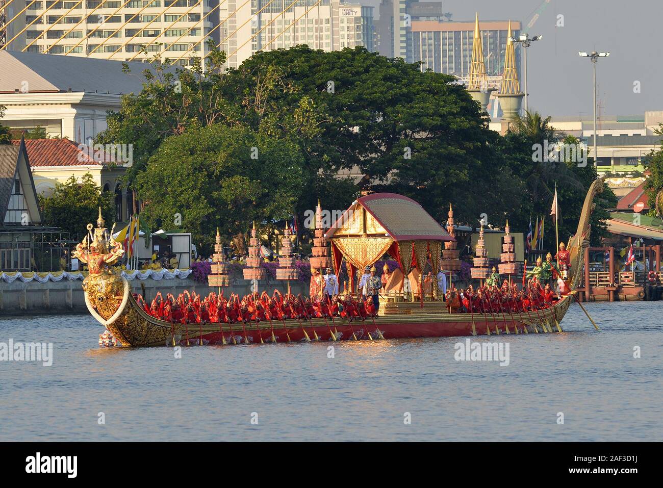 Bangkok. 12th Dec, 2019. Photo taken on Dec. 12, 2019 shows a view of the royal barge procession along the Chao Phraya River in Bangkok, Thailand. A spectacular royal barge procession which graced through Bangkok's main river on Thursday marked the completion of the royal coronation ceremony for King Vajiralongkorn. Credit: Rachen Sageamsak/Xinhua/Alamy Live News Stock Photo