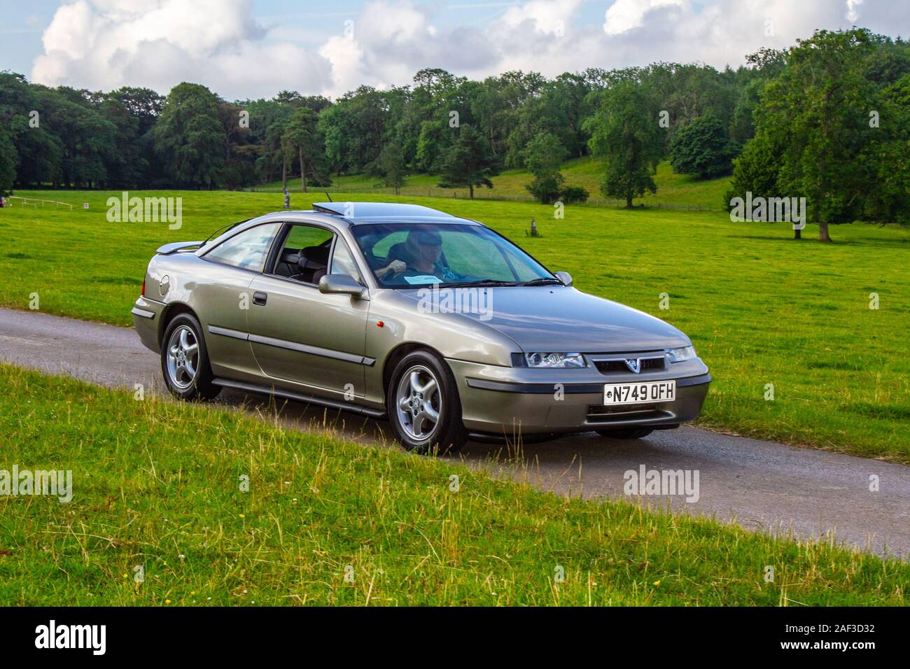 1996 90s silver Vauxhall Calibra V6; Classic cars, historics, cherished, old timers, collectable restored vintage veteran, vehicles of yesteryear arriving for the Mark Woodward historical motoring event at Leighton Hall, Carnforth, UK Stock Photo