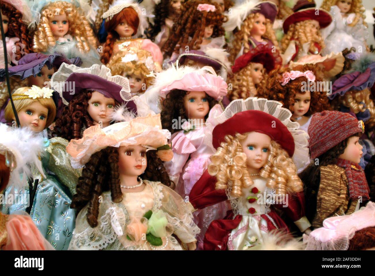 Dolls collectible for sale on market stall Stock Photo Alamy