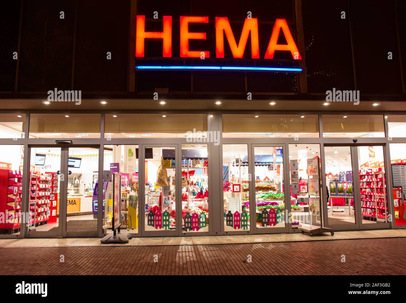 Nijmegen, Netherlands - December 3, 2019: Entrance of a HEMA store at  night. HEMA a Dutch discount retail chain Stock Photo - Alamy