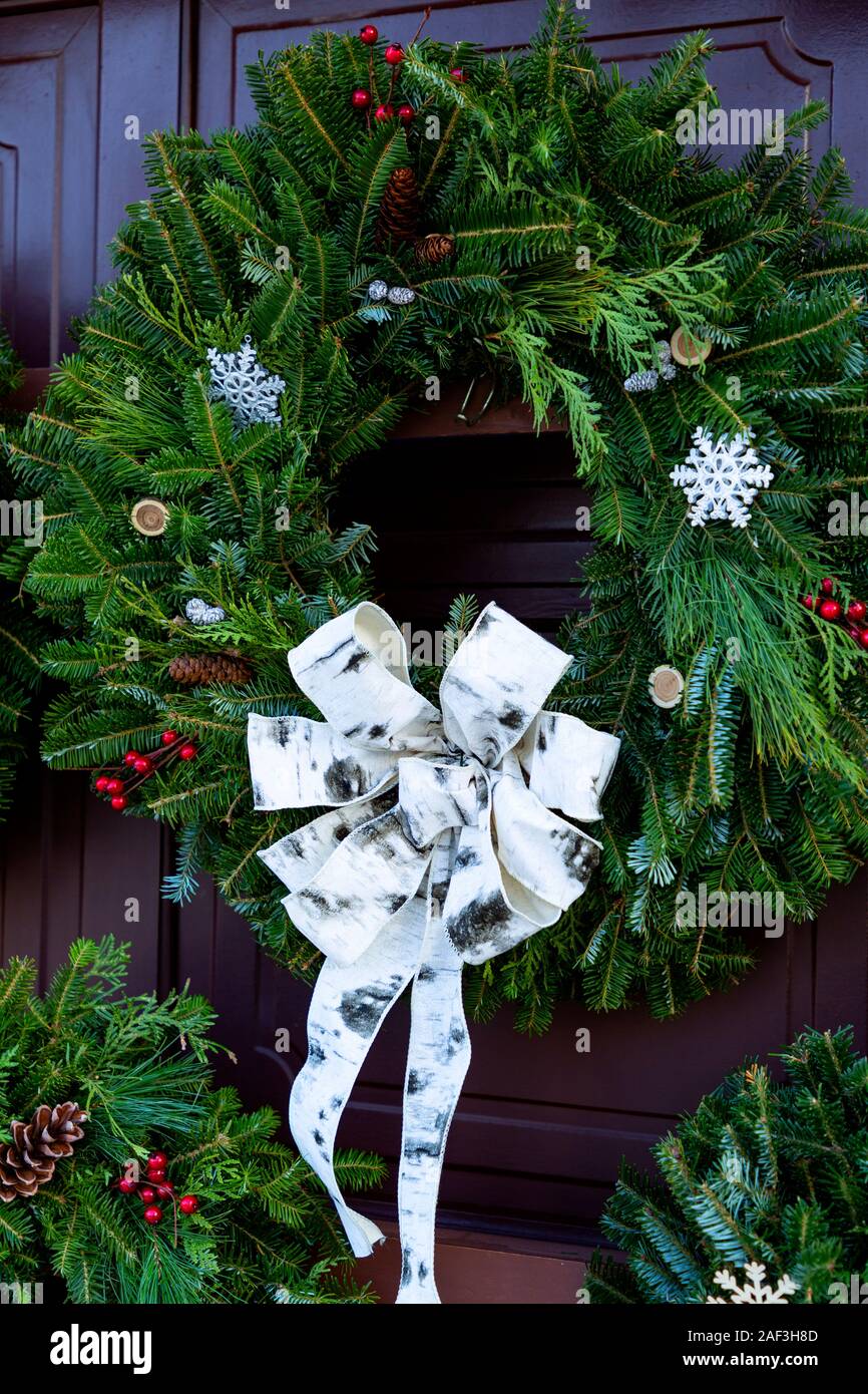 Ontario Canada.Christmas wreath on a wooden door Stock Photo