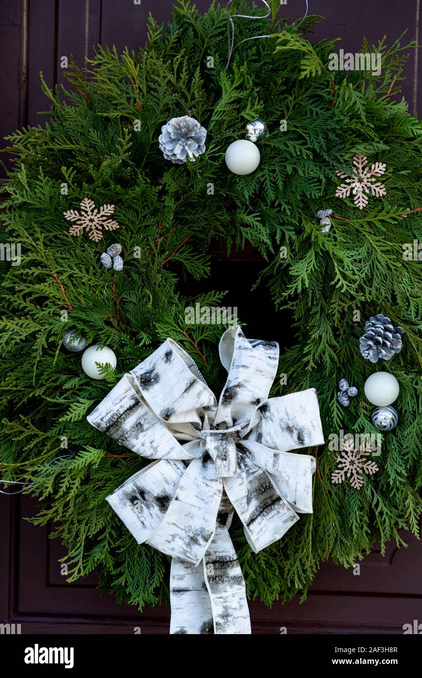 Ontario Canada.Christmas wreath on a wooden door Stock Photo