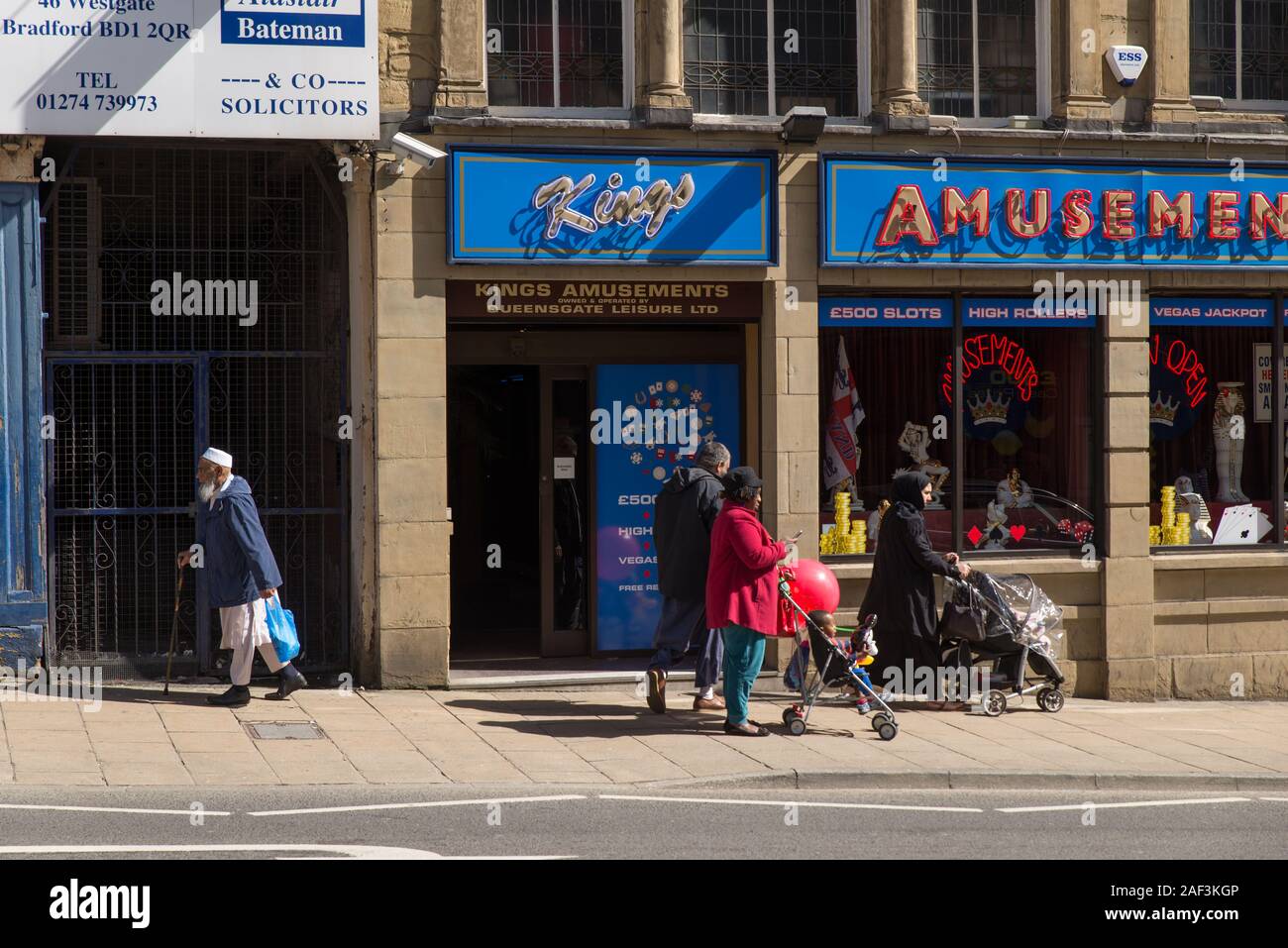 People of various origins in a street in Bradford, Yorkshire, Great Britain. Stock Photo