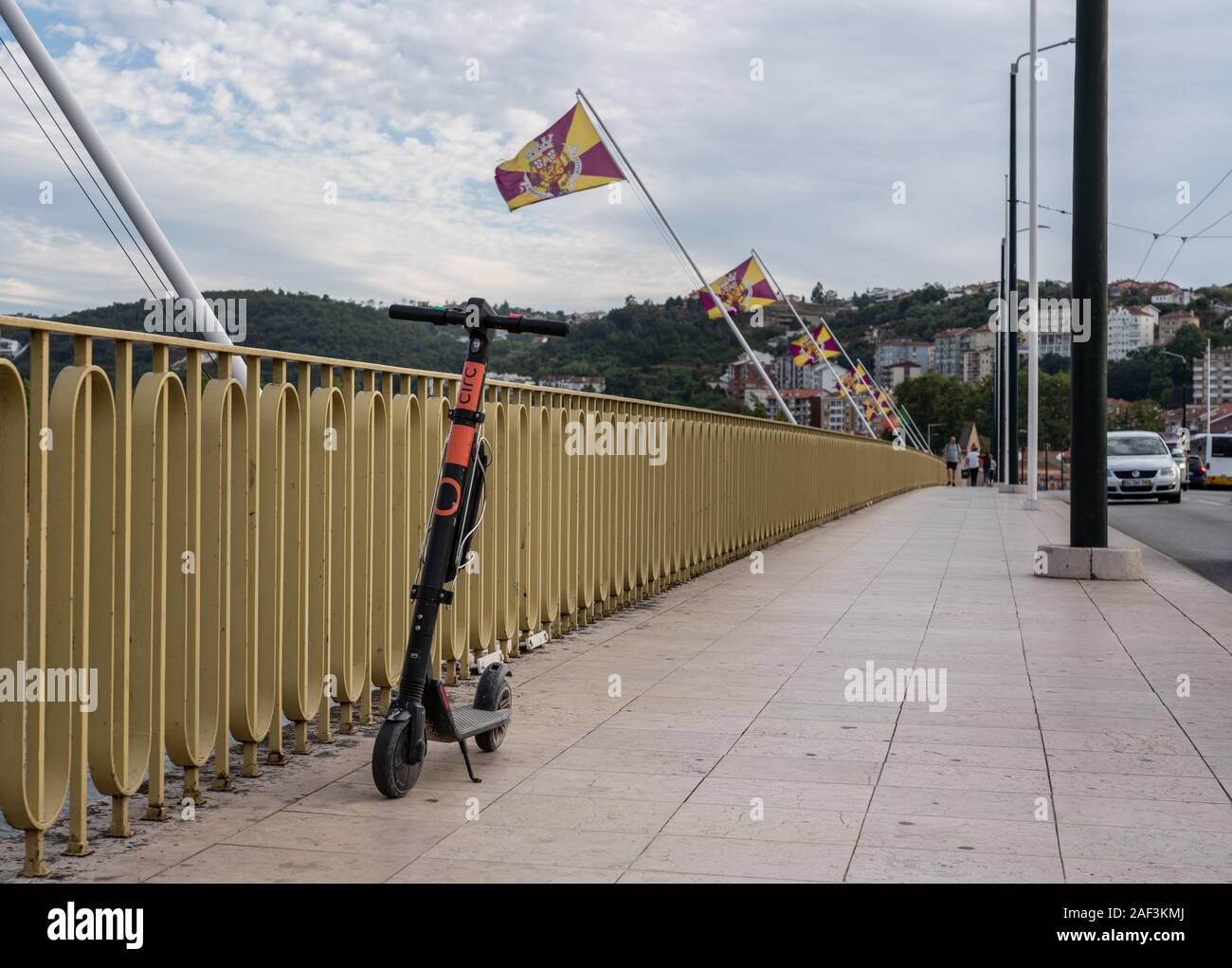 Coimbra, Portugal - 19 August 2019: Circ electric scooter parked on the Santa Clara bridge Stock Photo