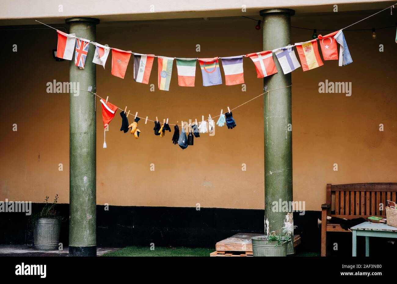 Kids gloves \u0026 hats hanging on a string 