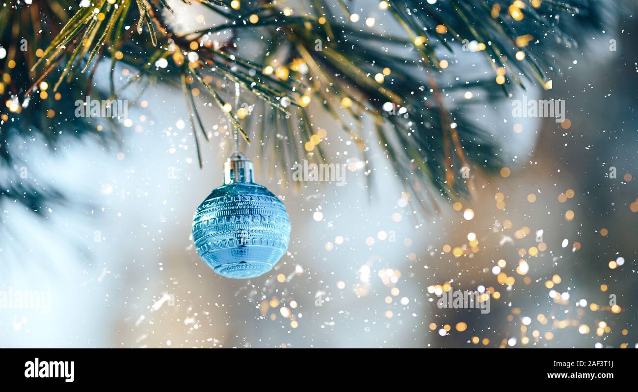 Christmas ball on the snowy fir Stock Photo - Alamy
