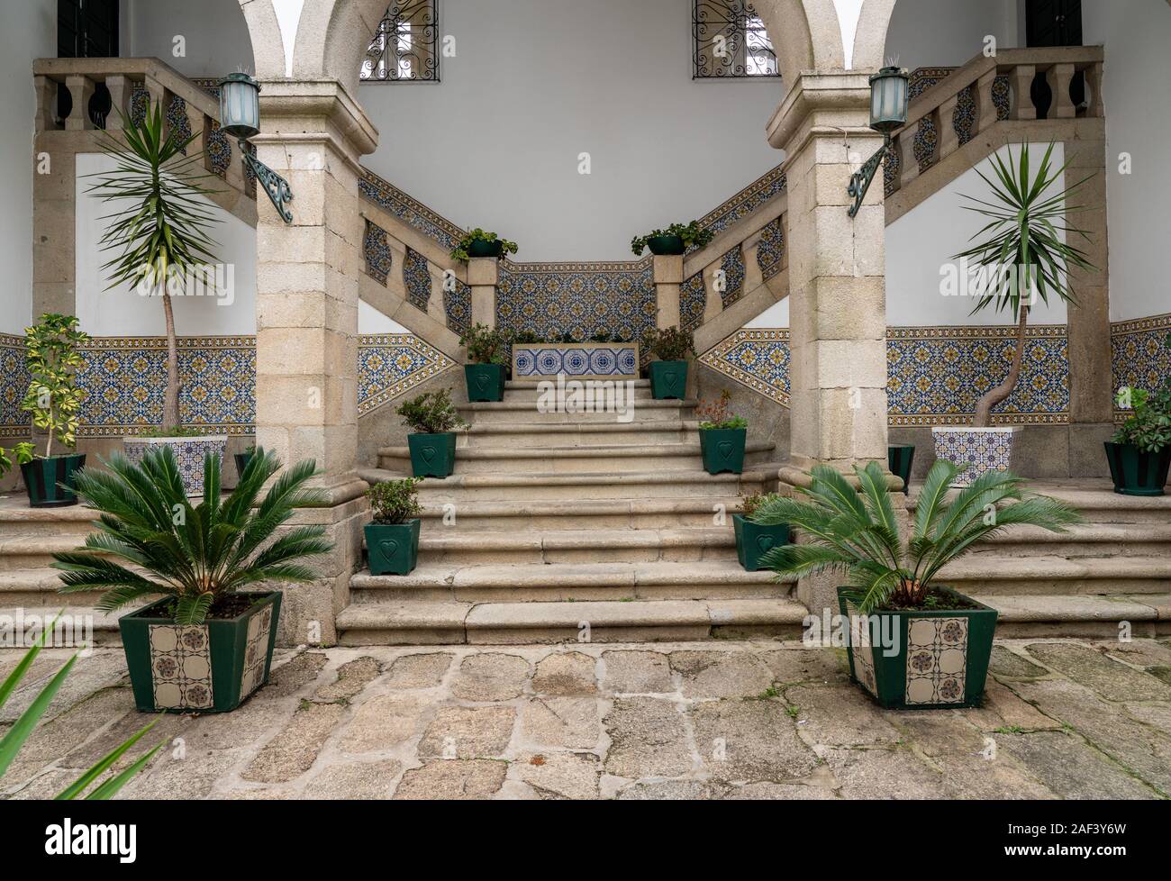 Guimaraes, Portugal - 18 August 2019: Interior courtyard of the Nossa Senhora do Carmo church with steps Stock Photo