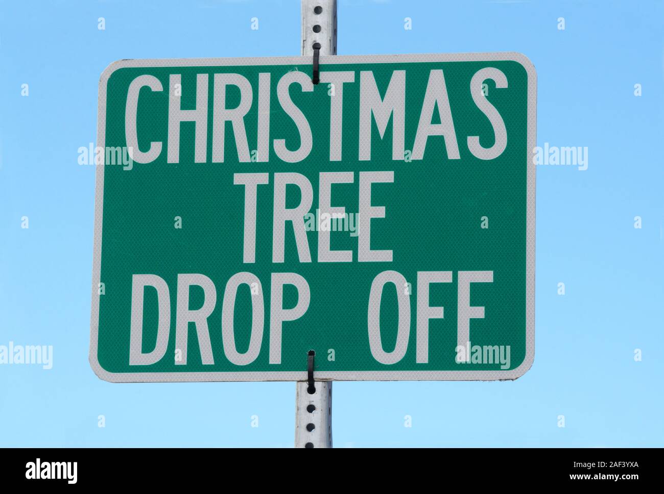 Sign for public city Christmas tree drop off for recycling into mulch