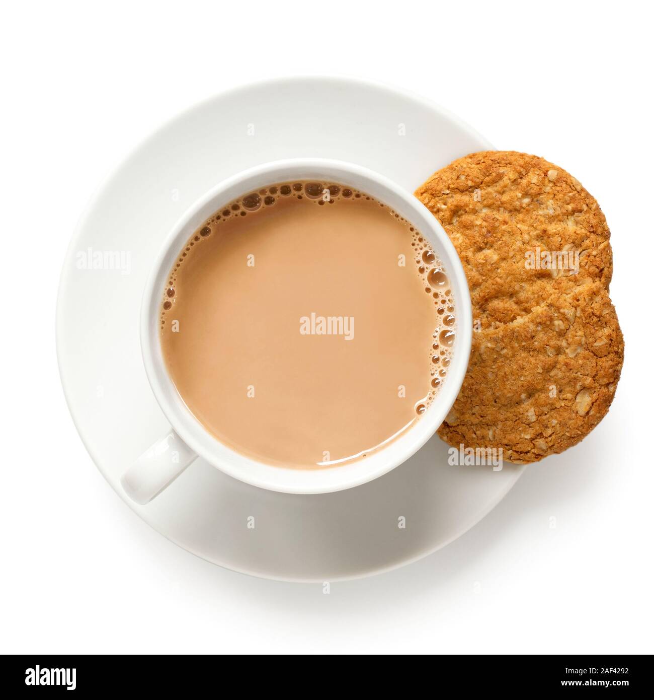 Cup Of Tea With Milk And One And Half Crunchy Oat And Wholemeal Biscuits Isolated On White White Porcelain Top View Stock Photo Alamy Cup Of Tea With Milk And One And Half Crunchy Oat And Wholemeal Biscuits Isolated On White White Porcelain Top View Stock Photo Alamy