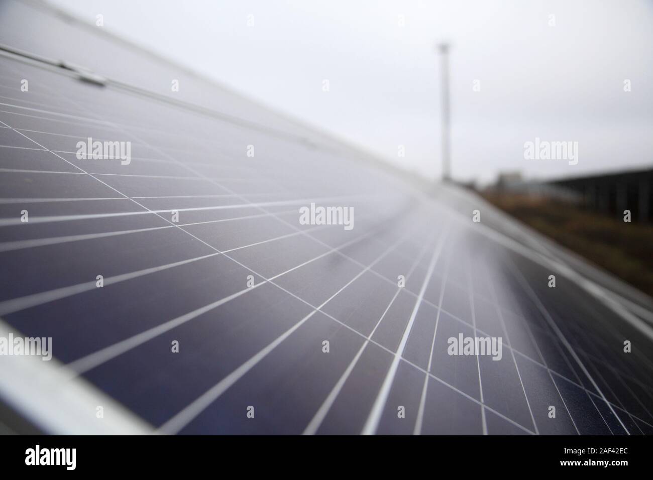 Installation of solar panels. Solar panel produces green, environmentally friendly energy from the sun. Installation of solar panels in rural areas. Stock Photo