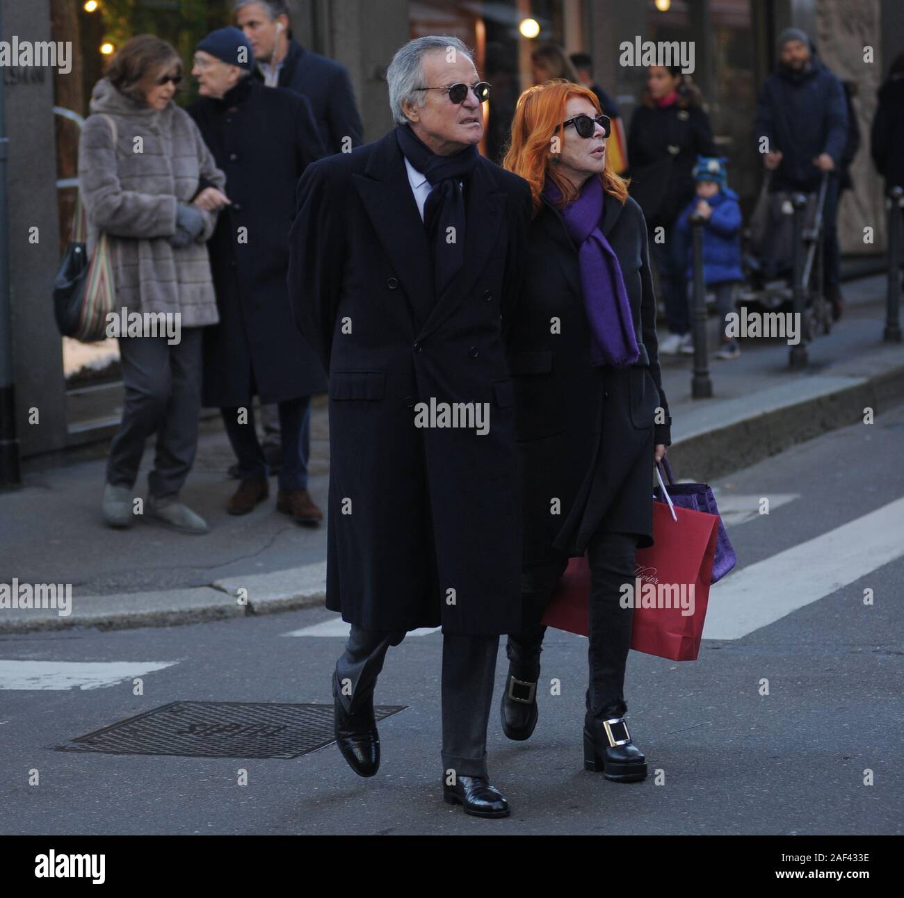 Milan, Giuliano Adreani with his wife in the shopping center Giuliano