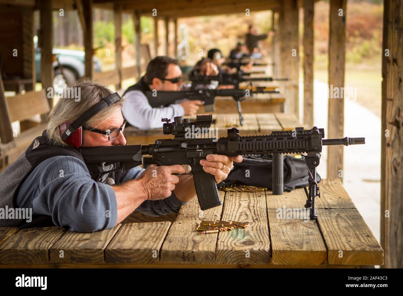 Weekend shooters at gun range in southeast Stock Photo Alamy