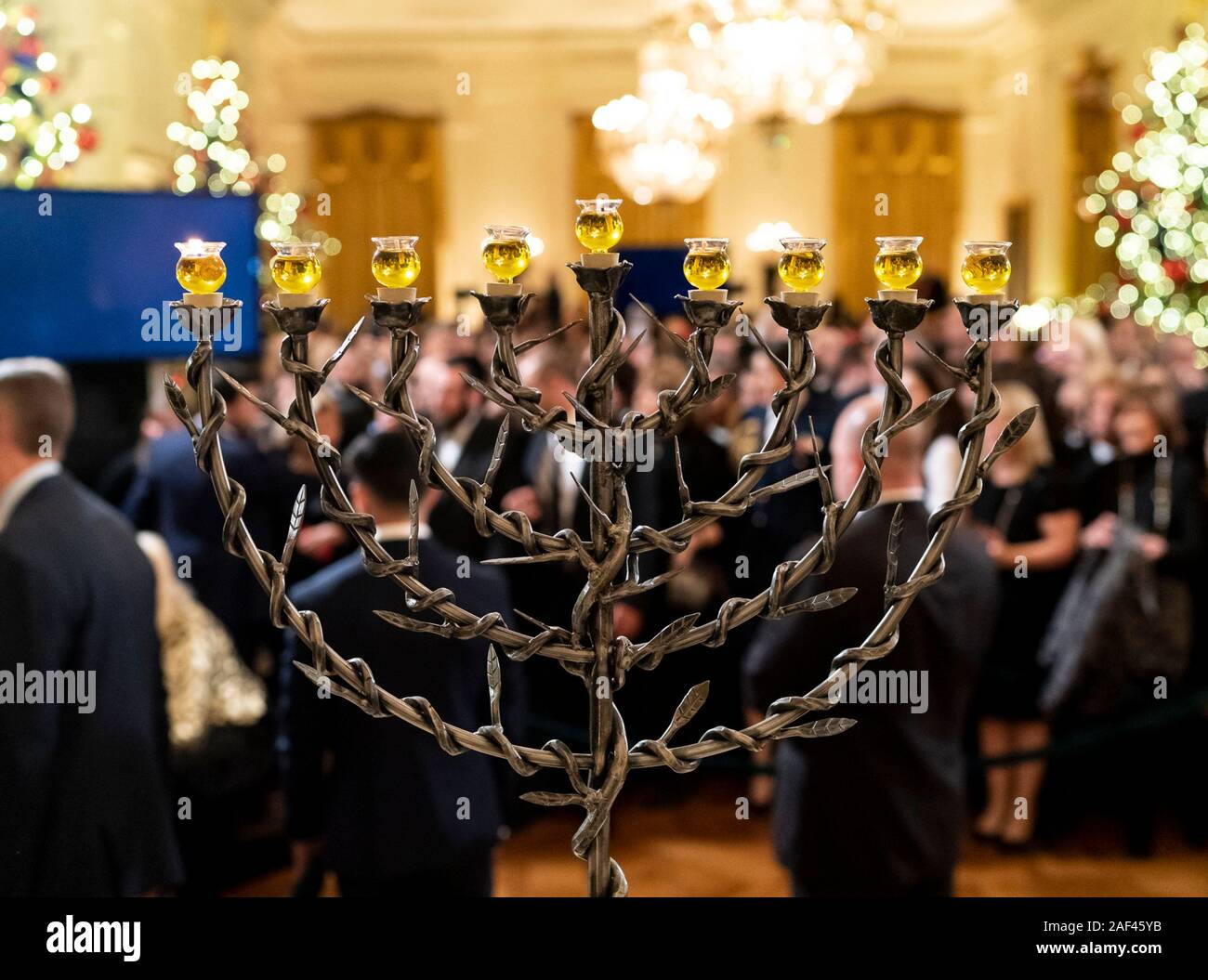 Washington, United States of America. 11 December, 2019. A light on the Menorah burns following the lighting ceremony with U.S President Donald Trump and First Lady Melania Trump during an evening Hanukkah Reception in the East Room of the White House December 11, 2019 in Washington, DC.  Credit: Joyce Boghosian/White House Photo/Alamy Live News Stock Photo