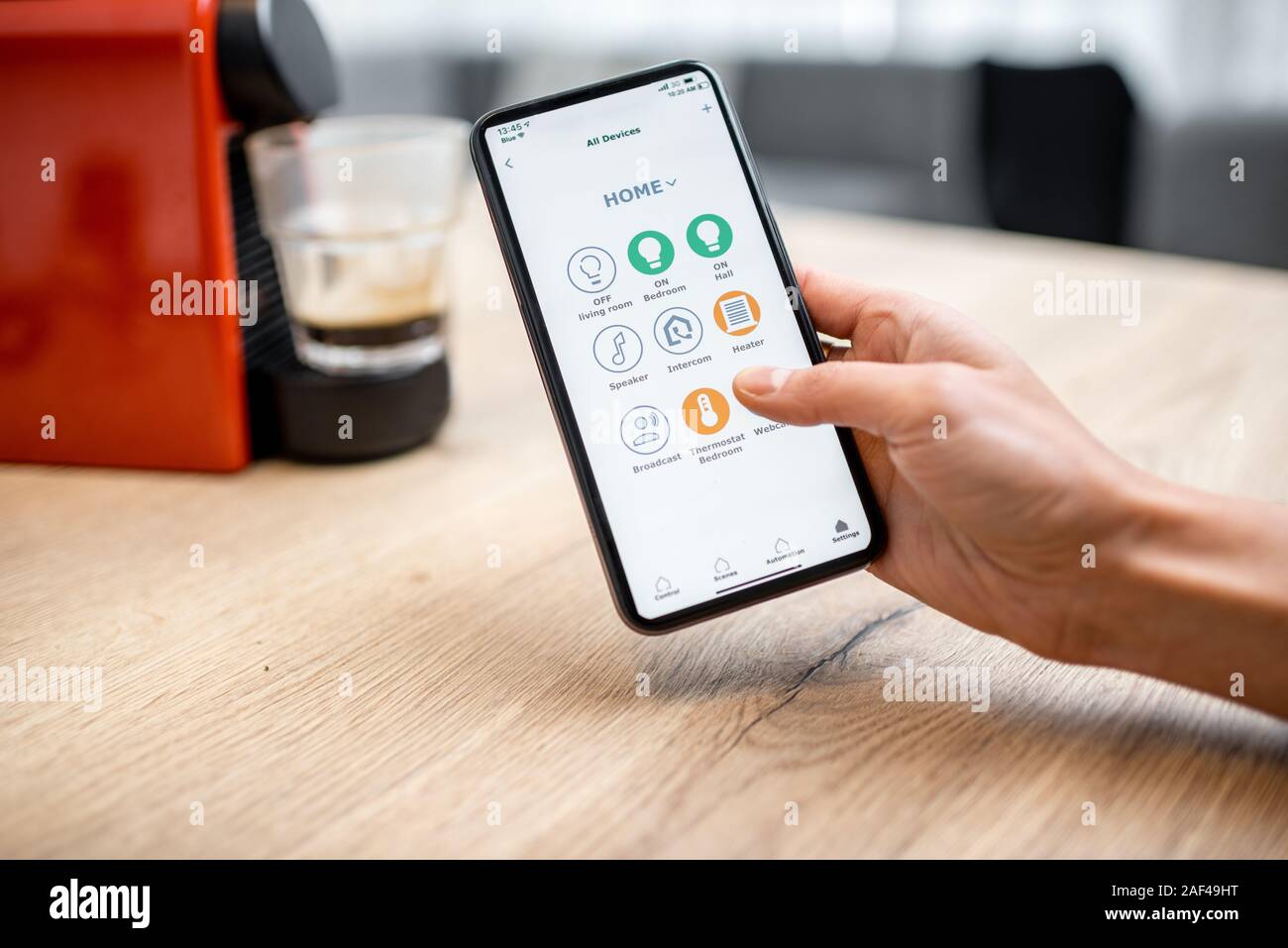 Modern coffee machine connected online with smartphone application. Concept  of a smart home and mobile application for managing devices at home Stock  Photo - Alamy