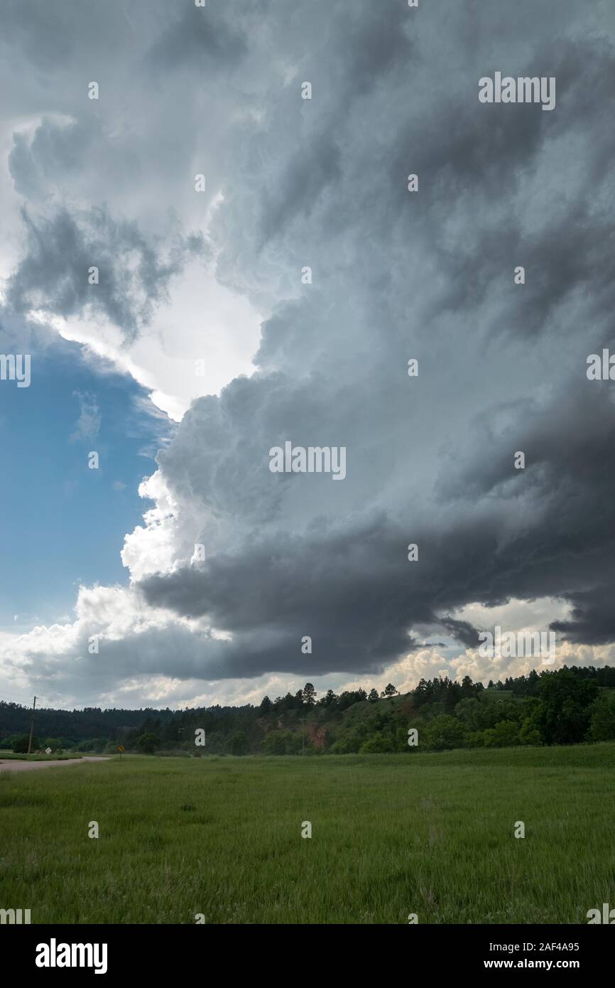Rotating wallcloud of a Low Precipitation supercell over the Black Hills in South Dakota Stock Photo