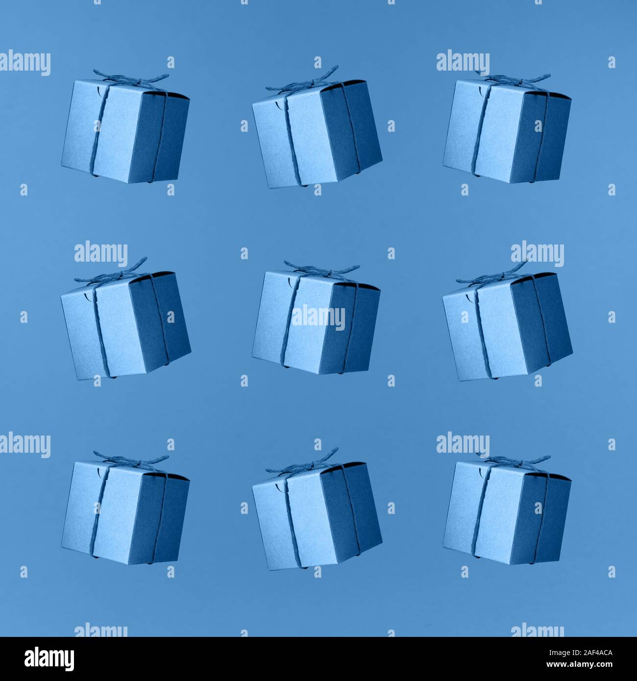 Seemless pattern of craft cardboard gift boxes on the solid classic