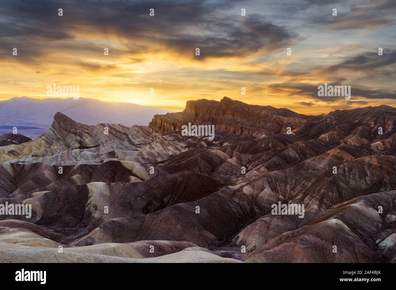 Zabriskie Point in the Death Valley at sunset, US Stock Photo