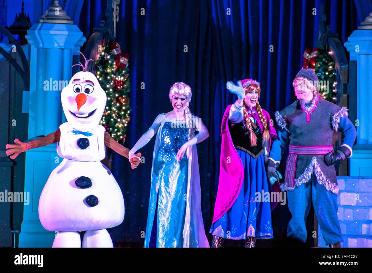 Orlando, Florida. December 05, 2019 . Olaf, Elsa ,Anna and Kristoff in A Frozen Holiday Wish at Magic Kingdom Park Stock Photo