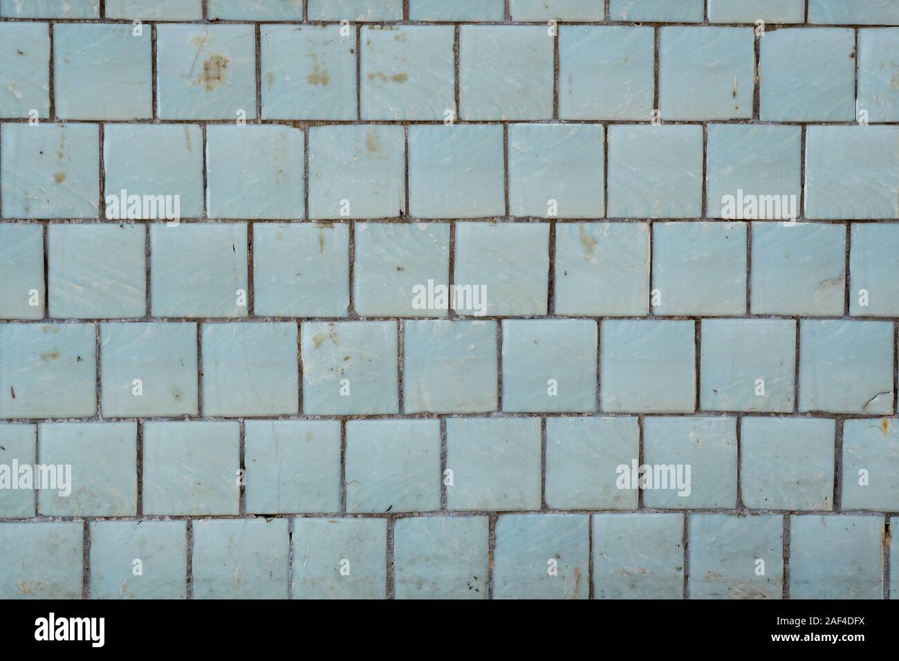 Blue tiles on a wall as a background image. Stock Photo