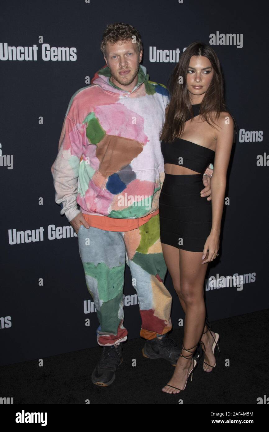 December 11, 2019, Los Angeles, California, USA: SEBASTIAN BEAR MCLARD (L) and EMILY RATAJKOWSKI attend theÂ LAÂ premiere of ''Uncut Gems'' at The Dome inÂ Los Angeles, California. (Credit Image: © Charlie Steffens/ZUMA Wire) Stock Photo