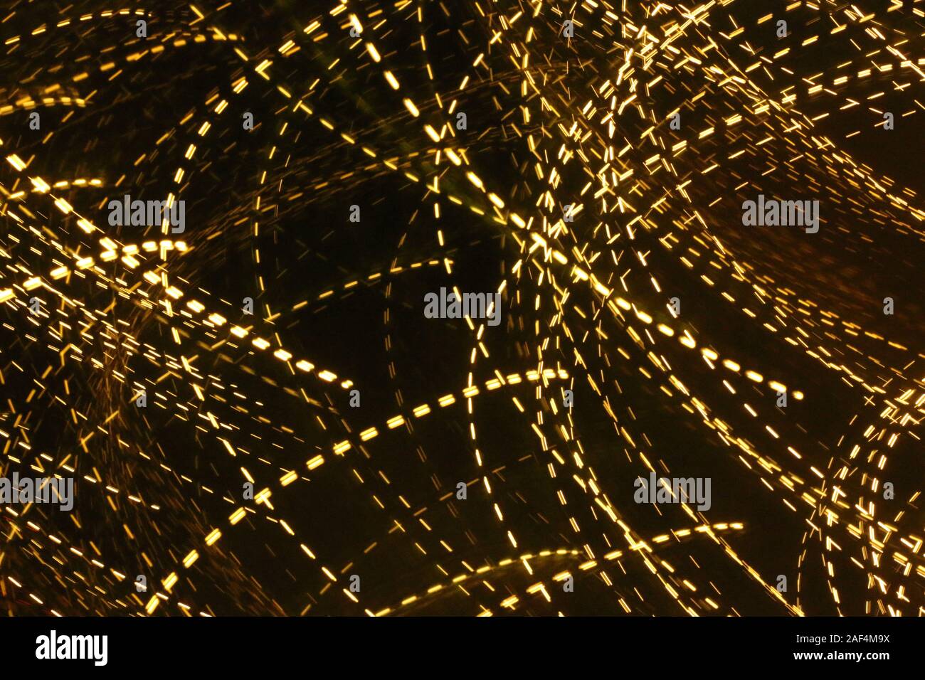 Yellow light trails in curves Stock Photo