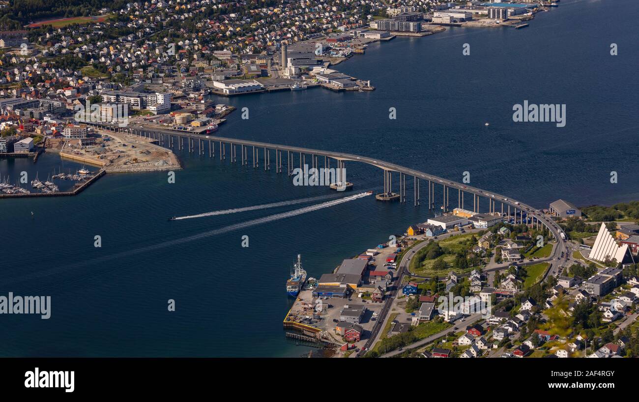 TROMSØ, NORWAY - Aerial view Tromsø Bridge, crossing Tromsøysundet strait from Tromsøya island, left, to Tramsdale. Stock Photo