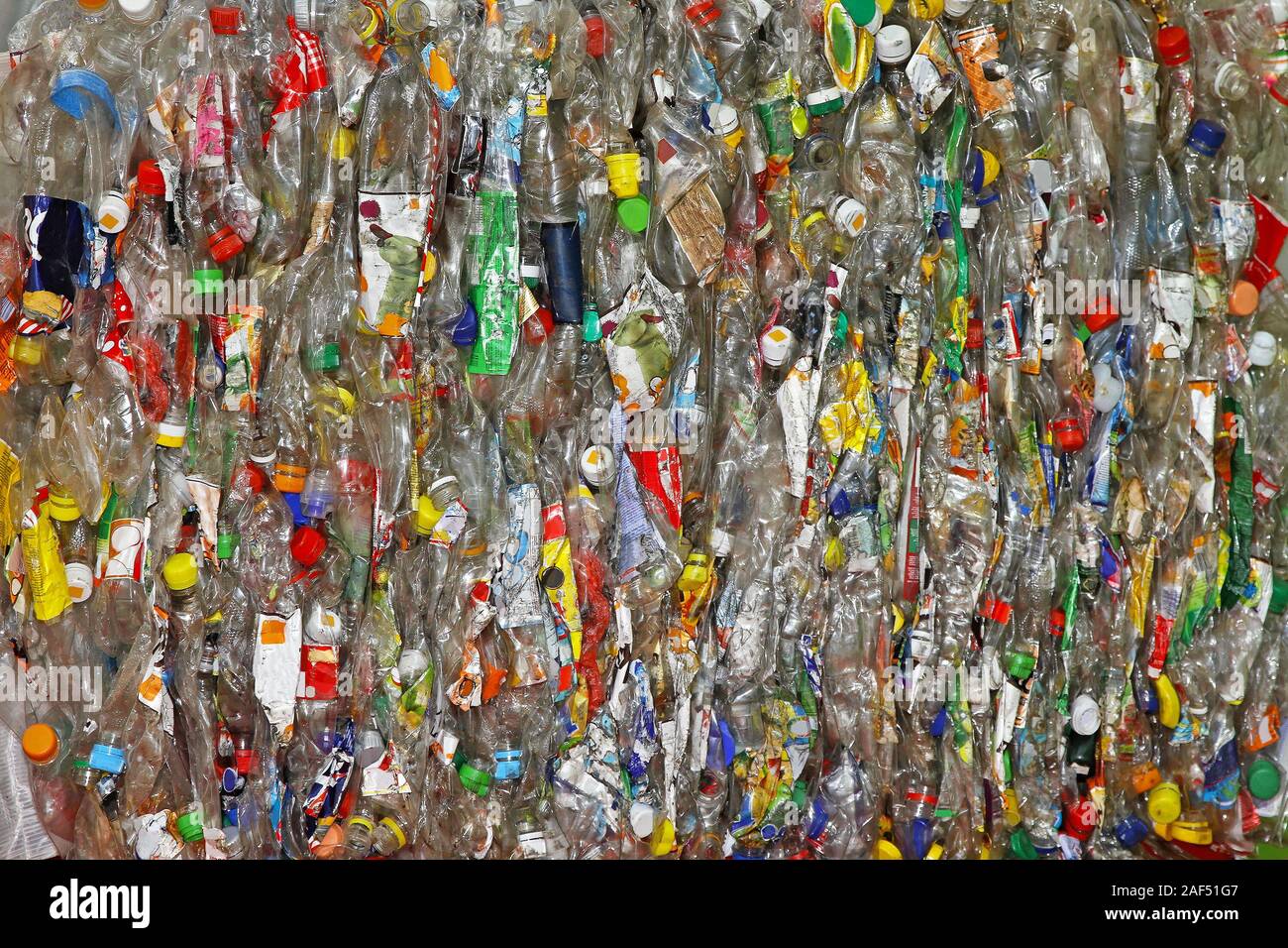 Crushed plastic bottles and compacted for recycle Stock Photo Alamy
