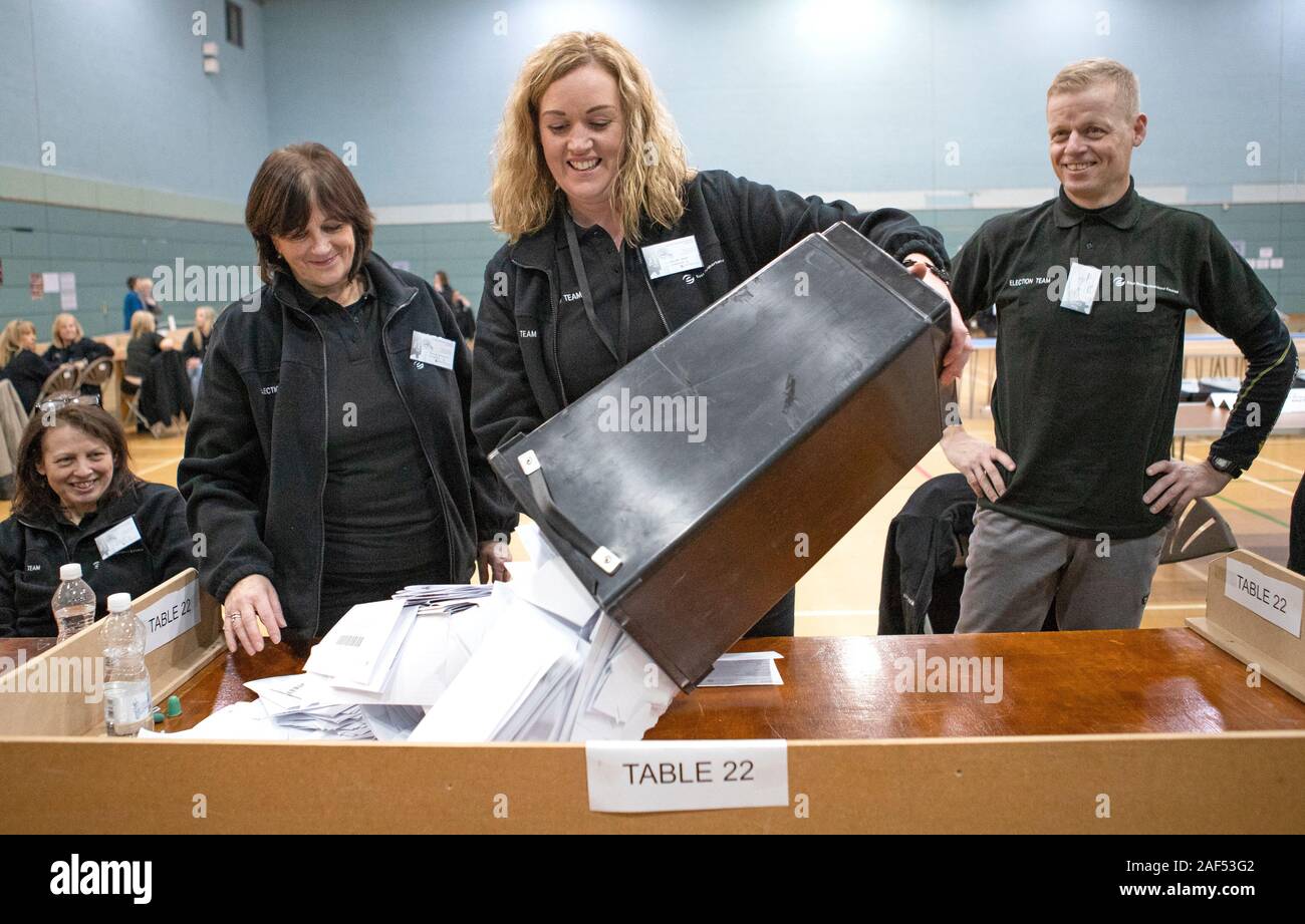 Ballot boxes are emptied at The Leisuredrome in Bishopbriggs for the East Dunbartonshire seat in the 2019 General Election count. Stock Photo