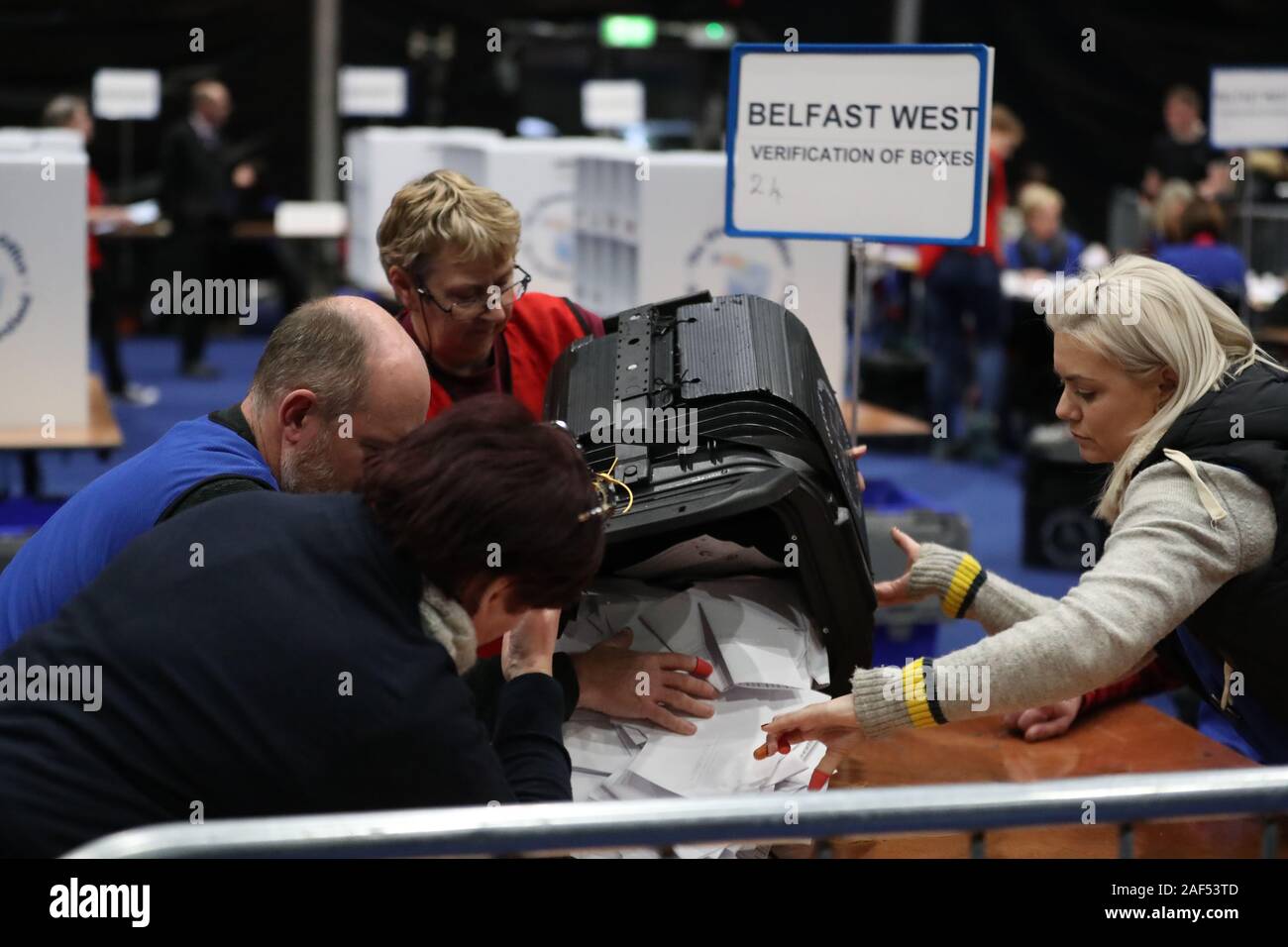 A ballot box is emptied during the count at the Titanic exhibition centre, Belfast, for the 2019 General Election. Stock Photo