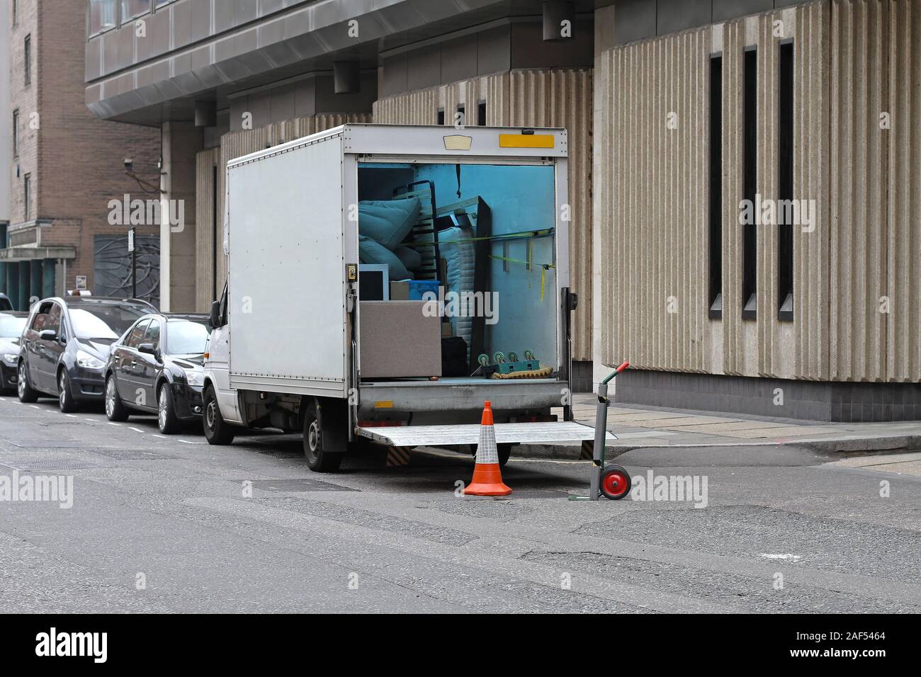 Moving van with loading ramp at London streets Stock Photo - Alamy