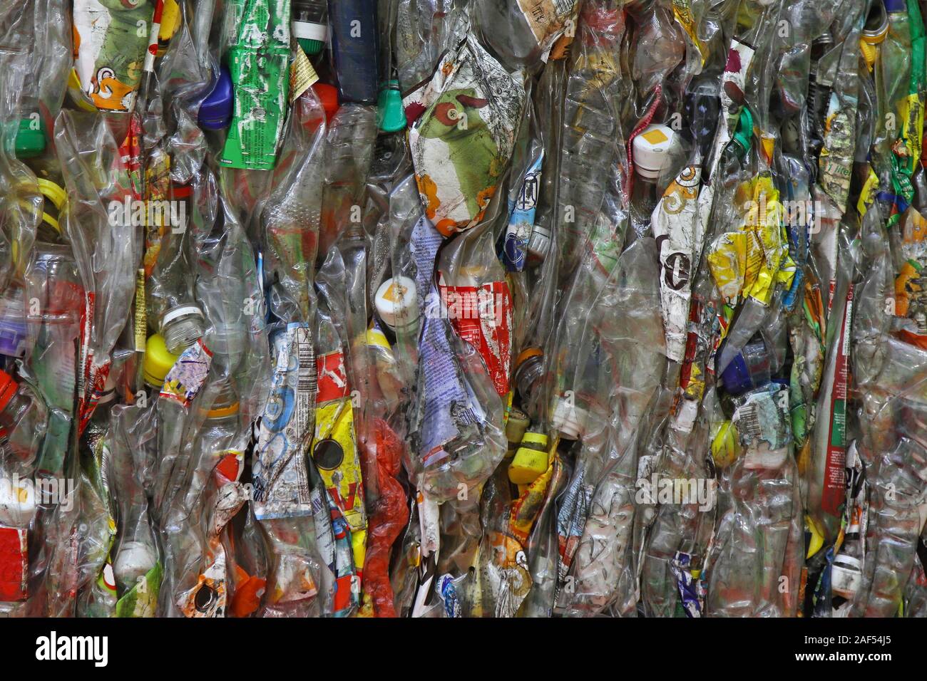 Crushed plastic bottles and compacted for recycle Stock Photo Alamy