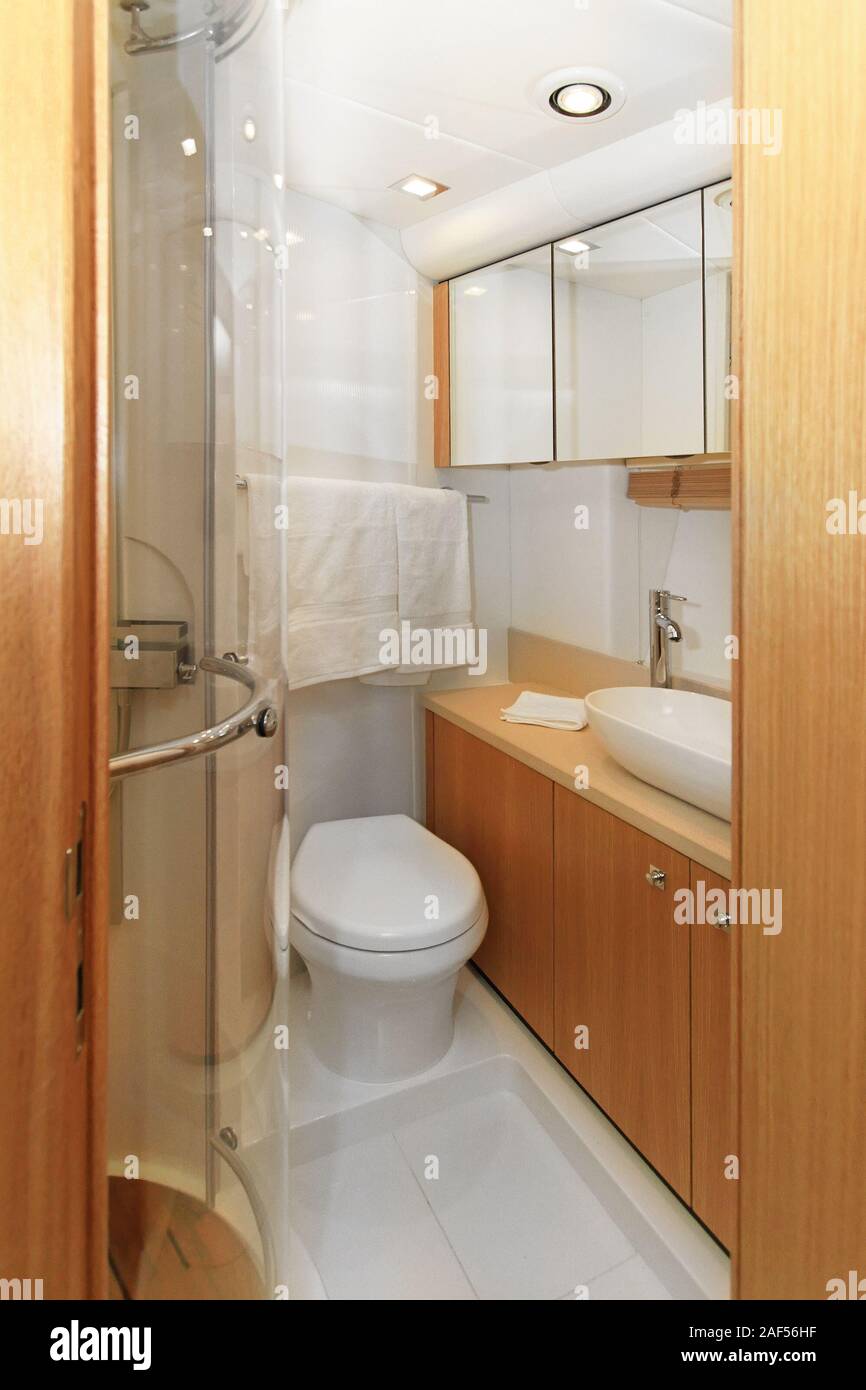 Luxurious wood furnished bathroom interior in yacht Stock Photo Alamy