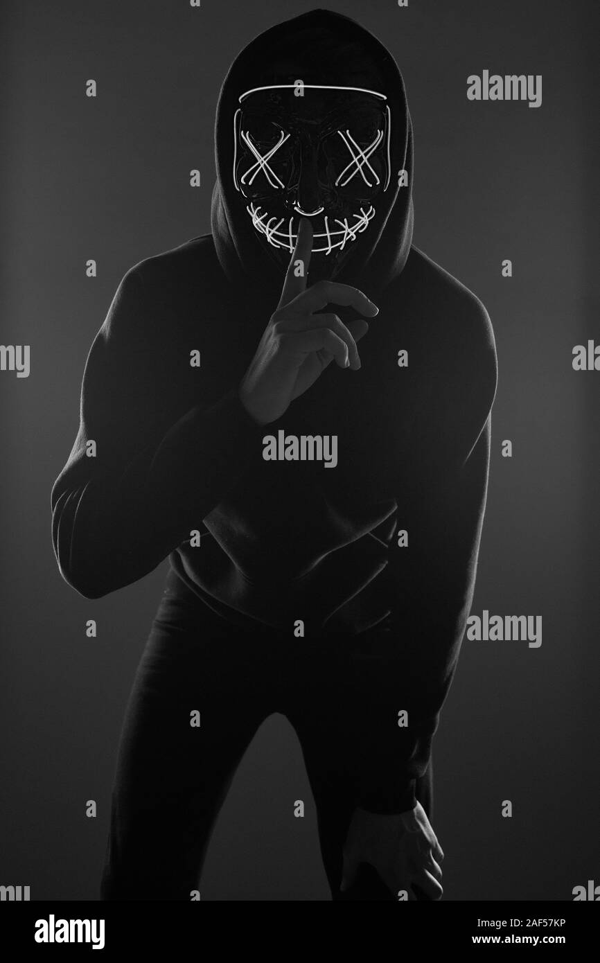 man in a black hoodie