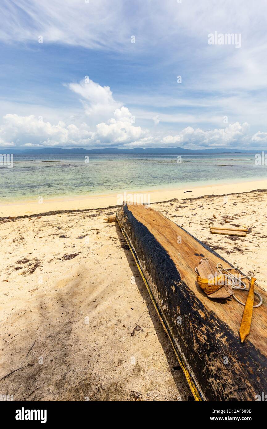 Kuna dugout canoe on sand beach on San Blas Islands, Panama Stock Photo