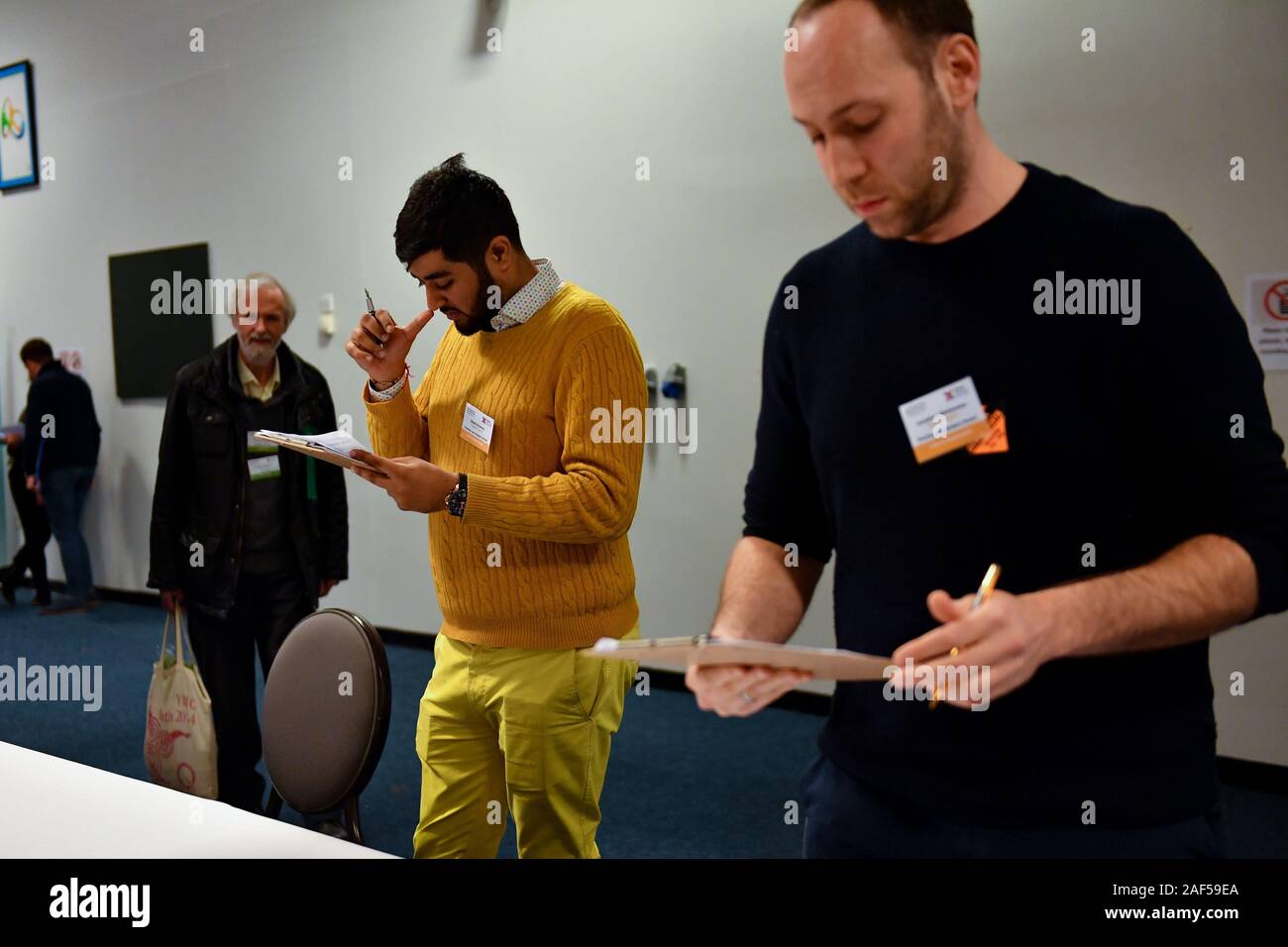 A count agent overlooks the counting for the Chipping Barnet, Finchley and Golders Green, and Hendon constituencies, at Allainz Park, London. Luciana Berger is contesting the Finchley and Golders Green constituency for the Liberal Democrats. Stock Photo