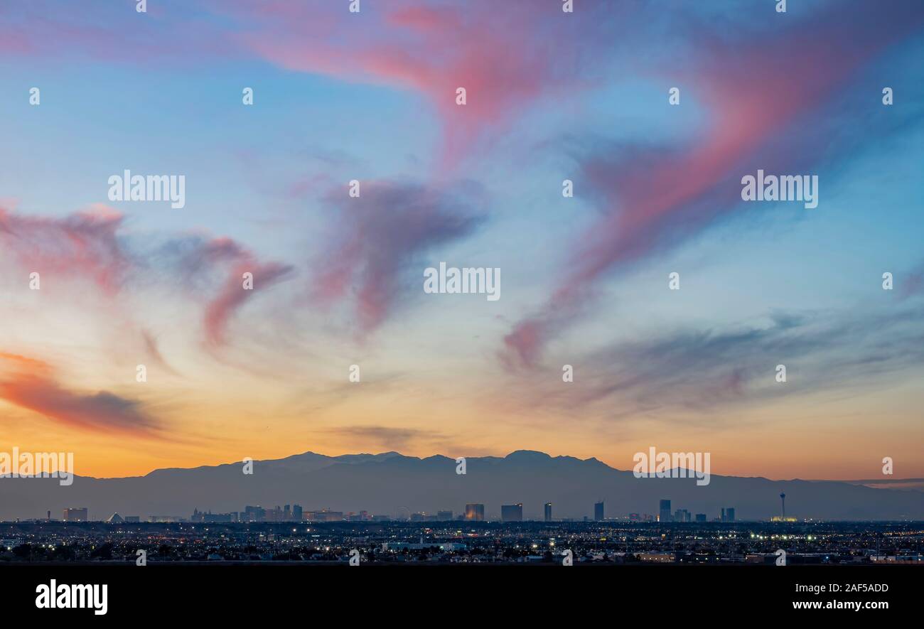 Sunset aerial view of the strip with mountain behind at Las Vegas, Nevada Stock Photo