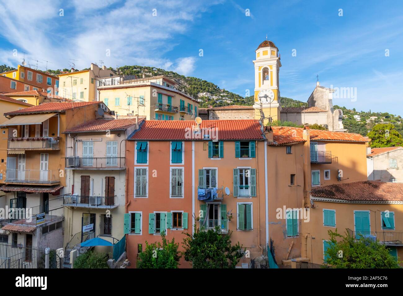 Colorful village of Villefranche Sur Mer, France and the yellow church