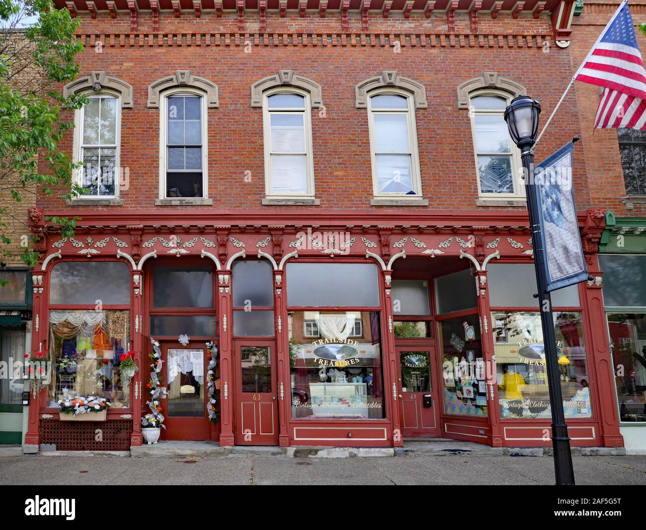 FINGER LAKES, NY, USA - MAY 2019:  Quaint old towns in the Finger Lakes Region preserve old main street storefronts, often used for antique shops. Stock Photo