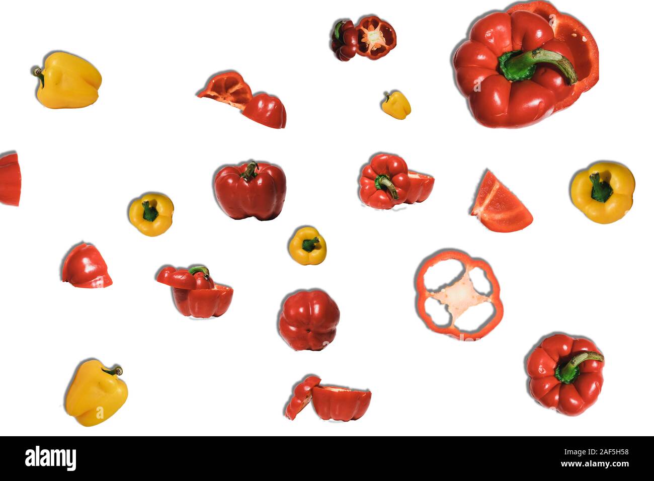 fresh yellow and red bell pepper on white background Stock Photo - Alamy