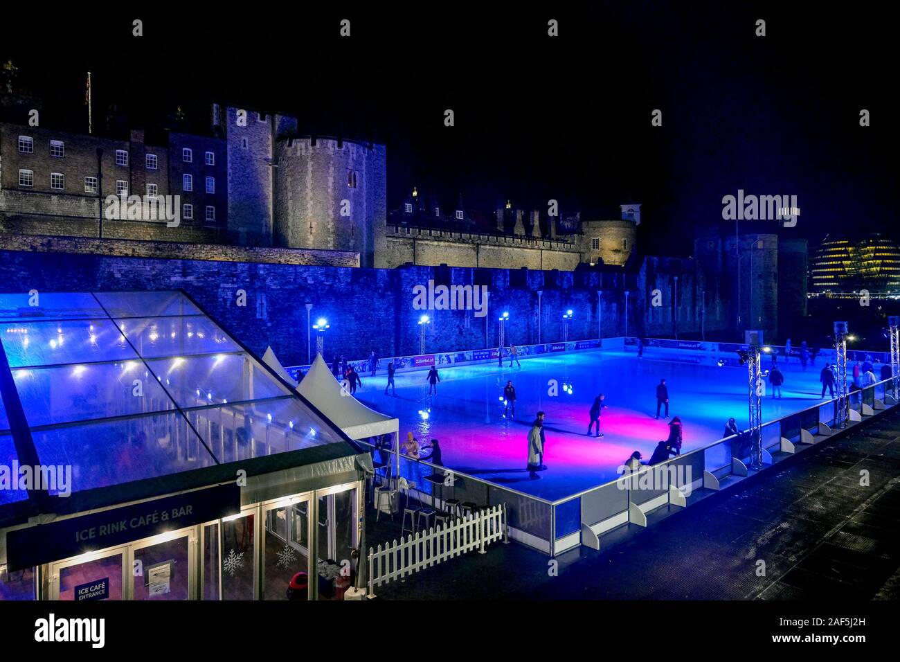 Ice skating rink at Tower of London, castle at night, London, England