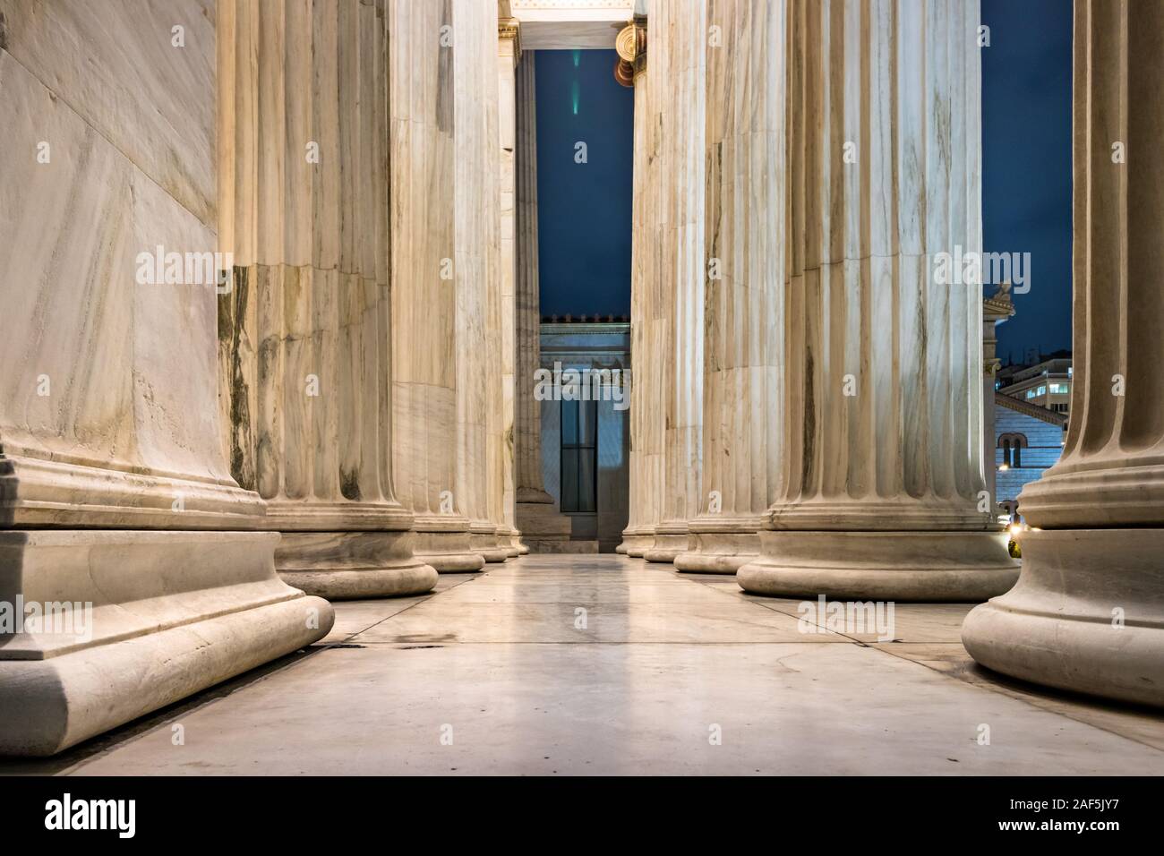 Detail of the ionic columns placed at the entrance of the Athens Academy, Greece. Stock Photo