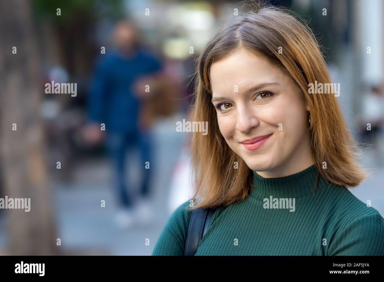 Portrait of a teenage woman looking camera Stock Photo - Alamy