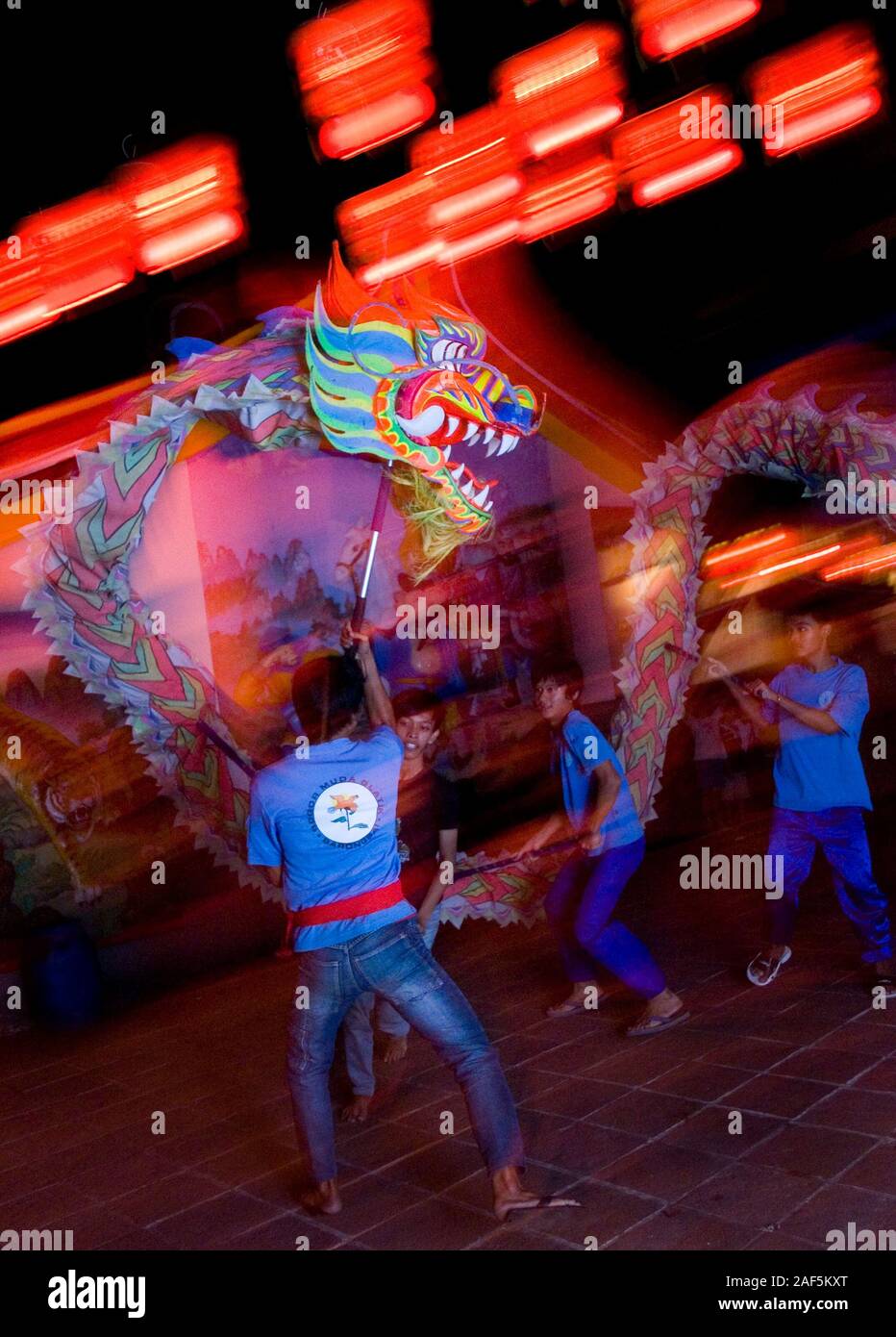 Dragon puppet dancers in Chinese New Year Eve. Stock Photo