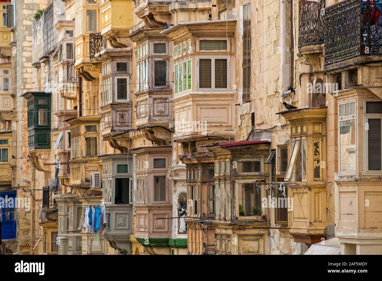 Detail shot of wooden balconies in obe of the streets of Valletta in Malta. Stock Photo