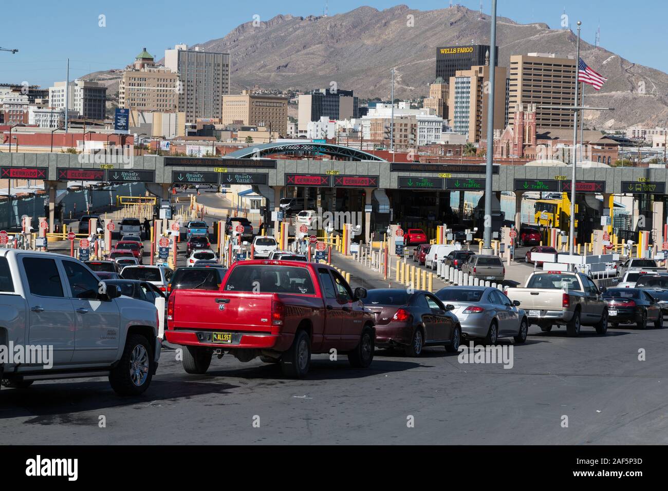 El Paso, Texas.  Automobiles Lined up to Enter the United States, Seen from Ciudad Juarez Side of the Border, Looking toward El Paso. Stock Photo