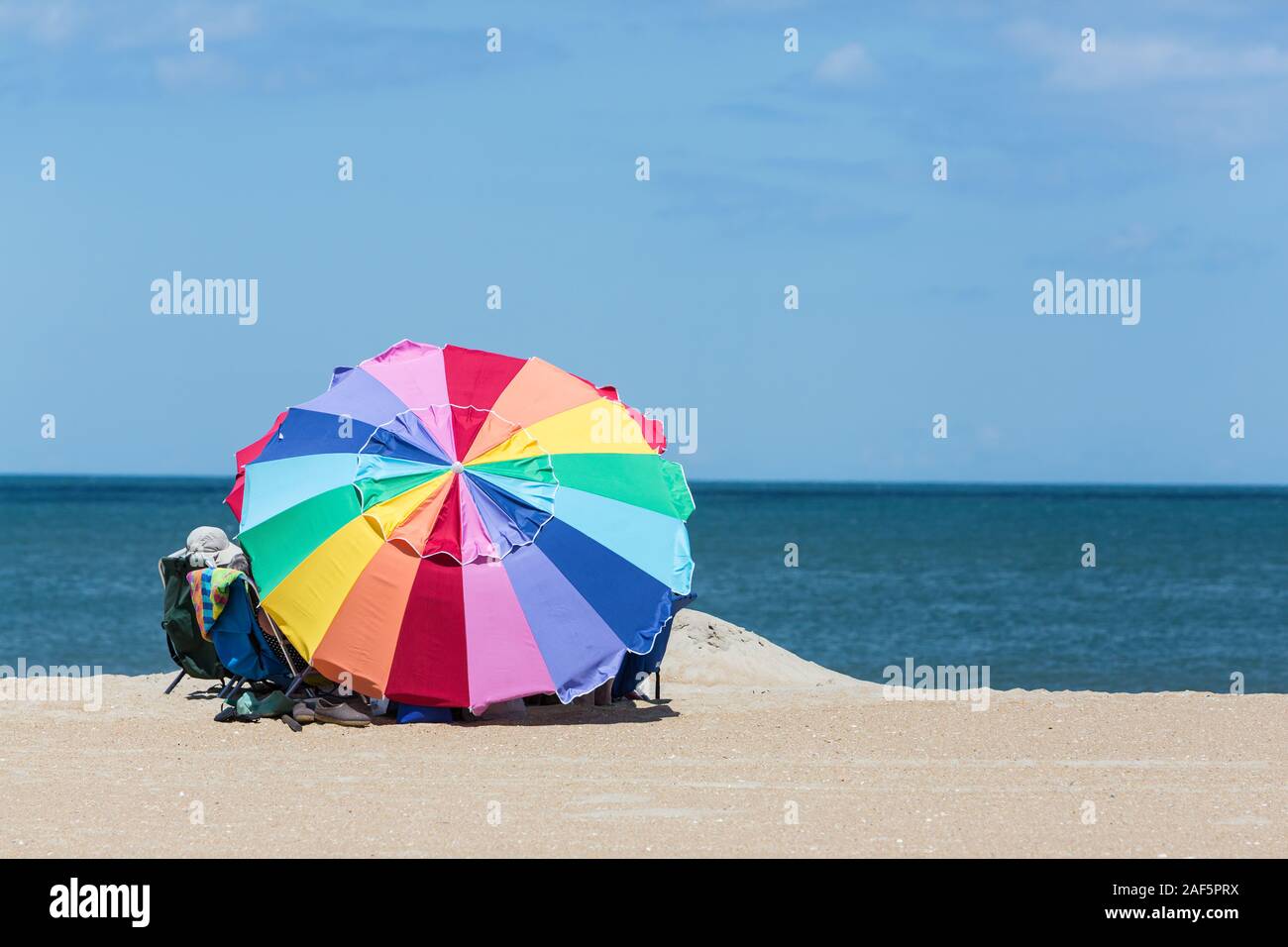 Avon, Outer Banks, North Carolina. Beach Umbrella and Family on the