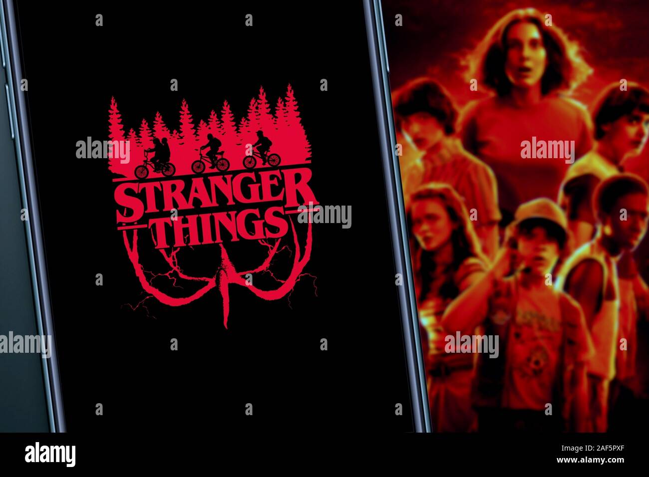 United States, New York. Sunday, September 29, 2019.Computer keyboard with the Iphone 11 pro with the Stranger Things logo. Stranger Things is an Amer Stock Photo