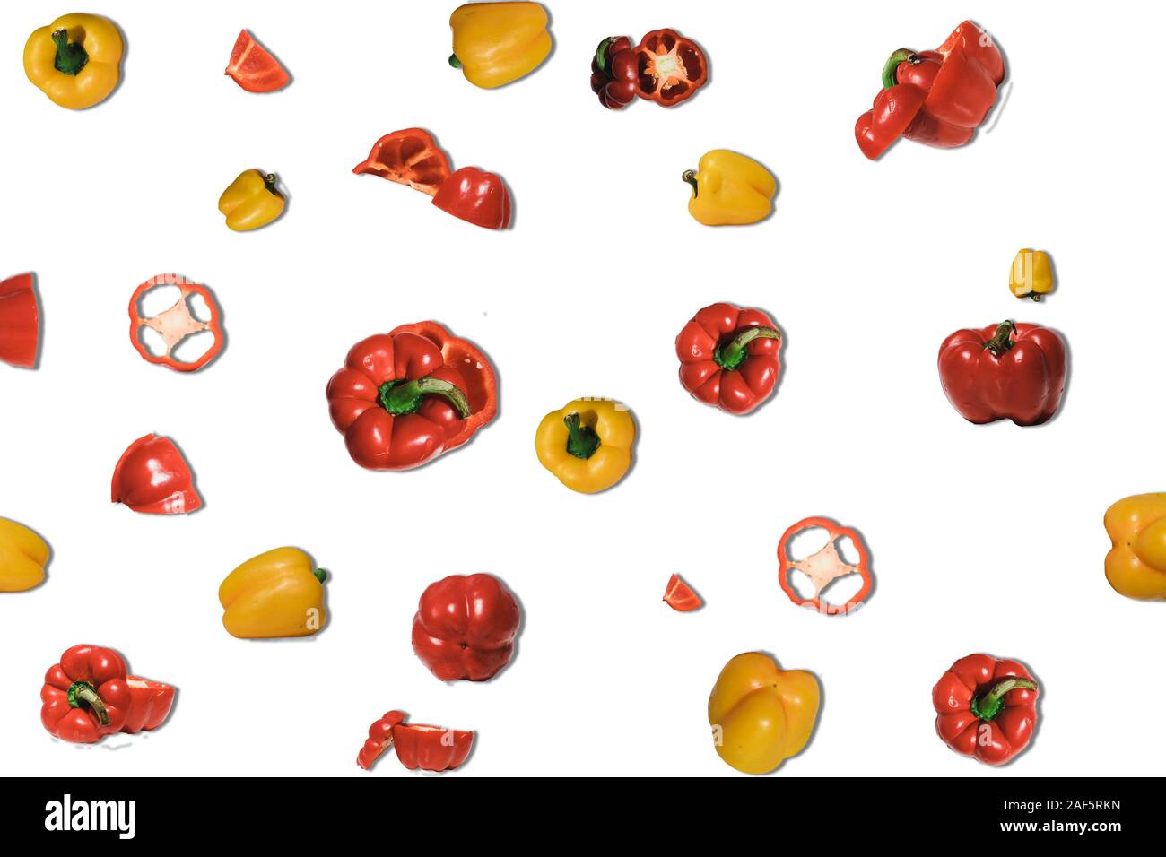 fresh yellow and red bell pepper on white background Stock Photo - Alamy
