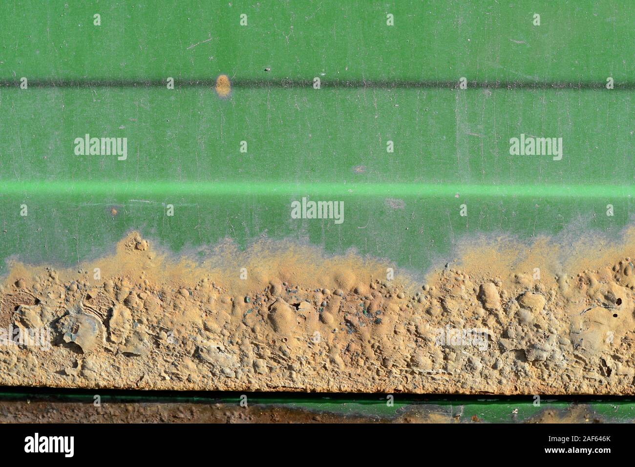 Dirty rusty green metal surface close-up. Abstract background Stock Photo